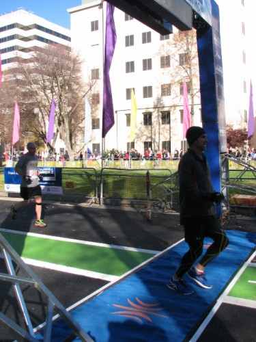 Jon (at left) about to cross the finish line