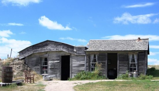 The Brown family sod house - the sod portion on the left was built in 1909