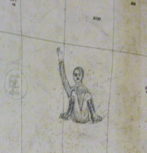 A caricature of Hitler in the map room